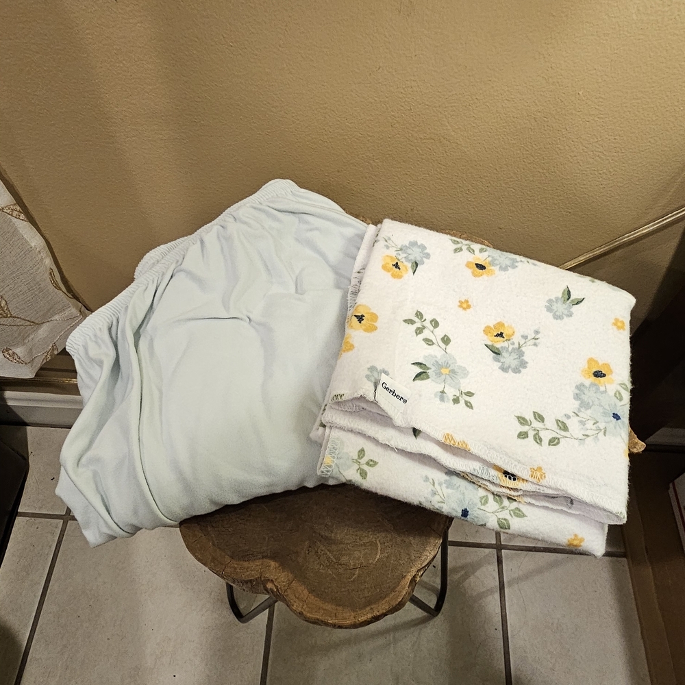 Gerber Floral Swaddle Blanket & Blue Crib Sheet Bundle